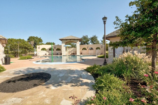 15913 Villa Frontera Dr, Bee Cave, TX 78738 - community pool with a patio