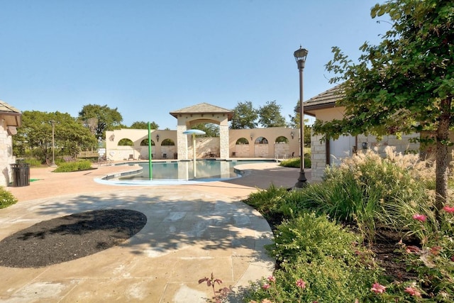 15913 Villa Frontera Dr, Bee Cave, TX 78738 - community pool featuring a patio area