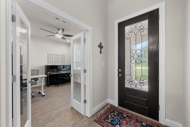 15913 Villa Frontera Dr, Bee Cave, TX 78738 - entrance foyer featuring french doors, light wood finished floors, and a ceiling fan