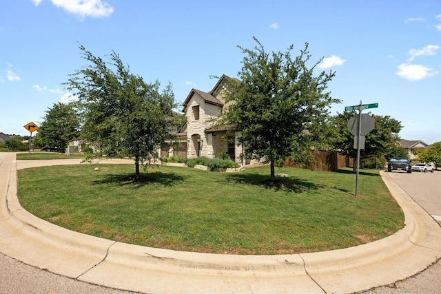 15913 Villa Frontera Dr, Bee Cave, TX 78738 - view of property hidden behind natural elements with stone siding