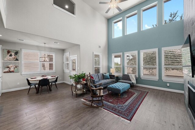 15913 Villa Frontera Dr, Bee Cave, TX 78738 - living room featuring wood finished floors, a towering ceiling, and ceiling fan