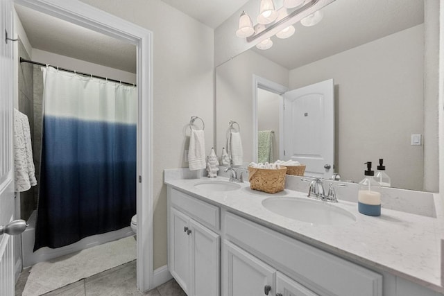 15913 Villa Frontera Dr, Bee Cave, TX 78738 - full bathroom featuring double vanity, tile patterned floors, and a chandelier