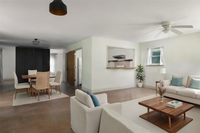 1917 Miles Ave, Austin, TX 78745 - living area with a ceiling fan and baseboards