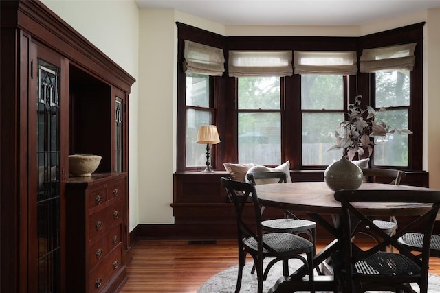 1917 Miles Ave, Austin, TX 78745 - dining area with wood finished floors and baseboards