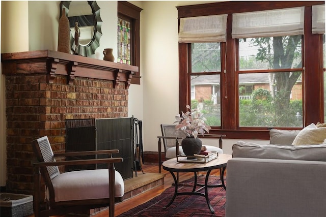 1917 Miles Ave, Austin, TX 78745 - living room featuring dark wood-style flooring and a fireplace