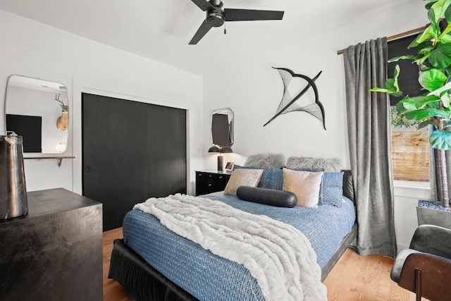 4802 Gladeview Dr Unit 2, Austin, TX 78745 - bedroom with wood finished floors, a closet, and a ceiling fan