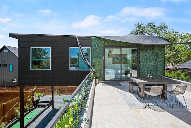 4802 Gladeview Dr Unit 2, Austin, TX 78745 - back of house featuring outdoor dining space and a patio