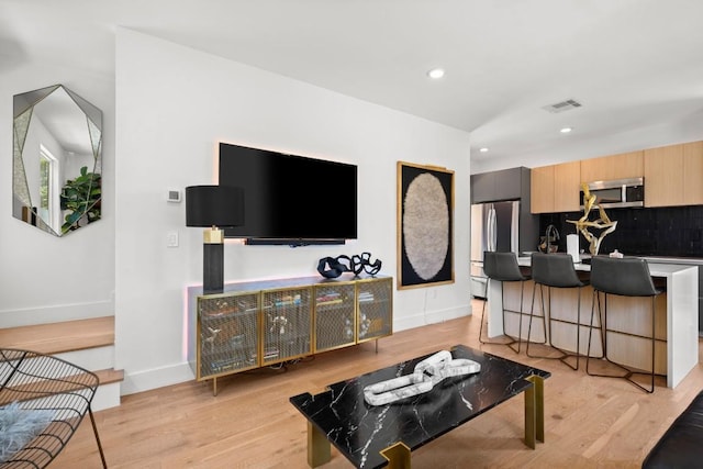 4802 Gladeview Dr Unit 2, Austin, TX 78745 - living area with light wood finished floors and recessed lighting