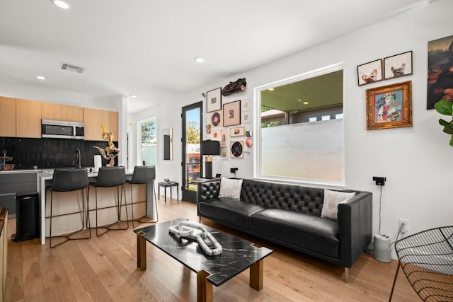 4802 Gladeview Dr Unit 2, Austin, TX 78745 - living room with light wood-type flooring and recessed lighting