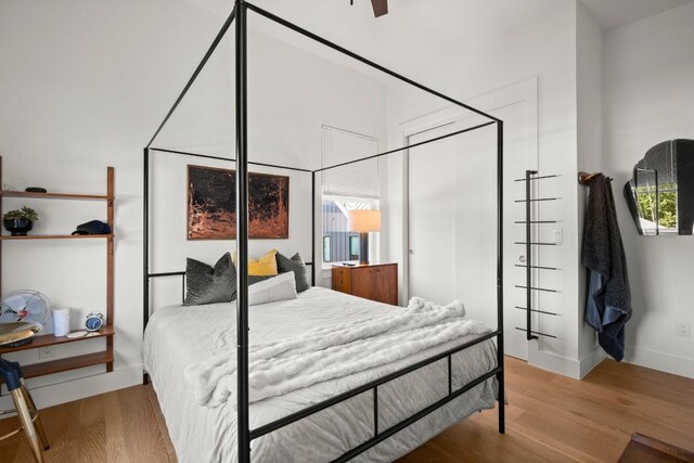 4802 Gladeview Dr Unit 2, Austin, TX 78745 - bedroom featuring wood finished floors and baseboards