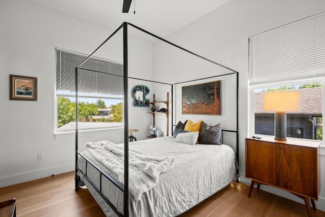 4802 Gladeview Dr Unit 2, Austin, TX 78745 - bedroom with wood finished floors and baseboards