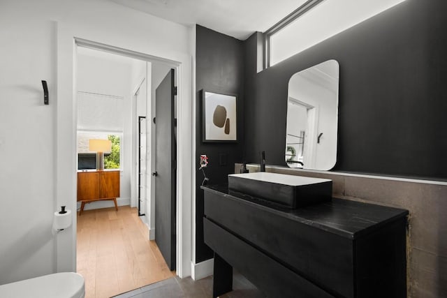 4802 Gladeview Dr Unit 2, Austin, TX 78745 - bathroom featuring vanity and wood finished floors