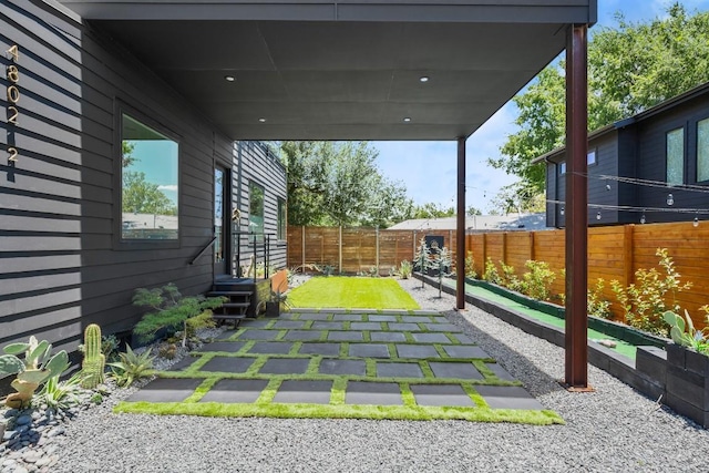 4802 Gladeview Dr Unit 2, Austin, TX 78745 - fenced backyard featuring entry steps