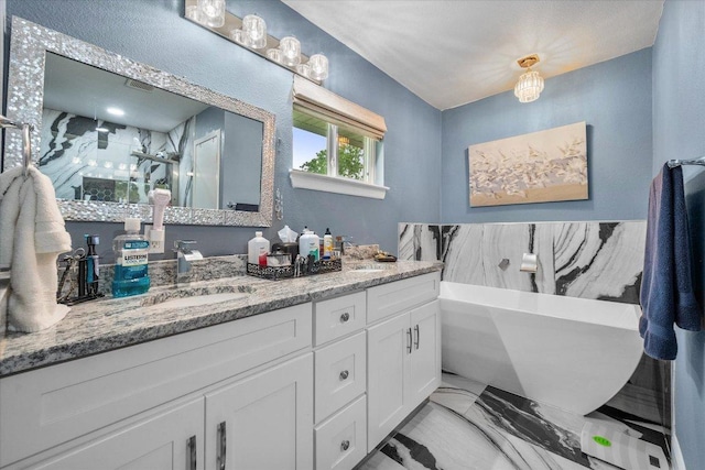 1410 Hummingbird Dr, Hillsboro, TX 76645 - bathroom with marble finish flooring, a freestanding bath, double vanity, and a shower stall