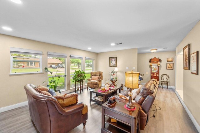 1410 Hummingbird Dr, Hillsboro, TX 76645 - living area with light wood-type flooring and recessed lighting