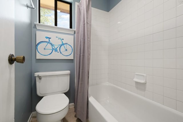 132 Spanish Oak Dr, Georgetown, TX 78628 - bathroom with baseboards and shower / bath combo with shower curtain