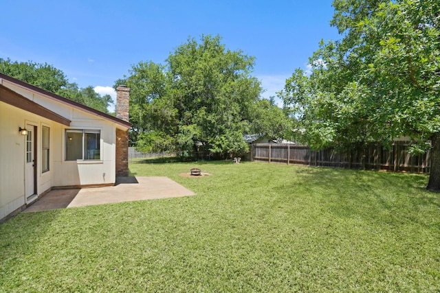 132 Spanish Oak Dr, Georgetown, TX 78628 - fenced backyard with a patio
