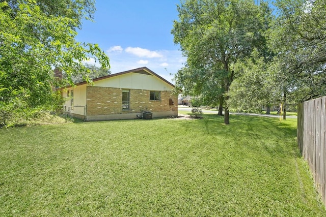 132 Spanish Oak Dr, Georgetown, TX 78628 - back of house with brick siding