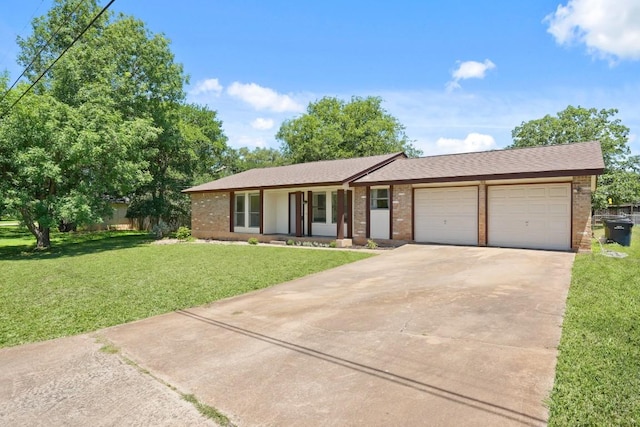 132 Spanish Oak Dr, Georgetown, TX 78628 - ranch-style house with brick siding, a garage, concrete driveway, a front yard, and roof with shingles