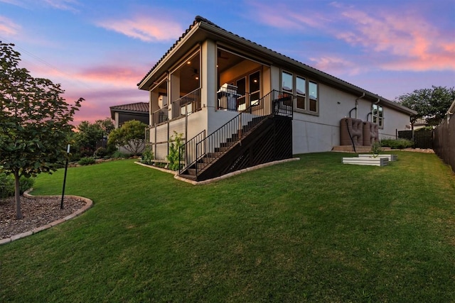 9110 Bayshore Bnd Unit 30, Austin, TX 78726 - back of property at dusk featuring stairs and stucco siding