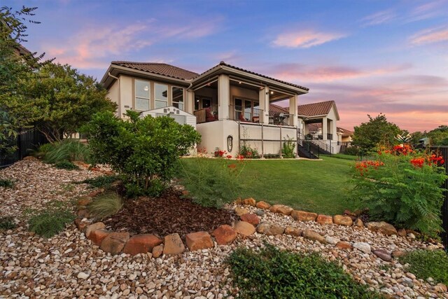 9110 Bayshore Bnd Unit 30, Austin, TX 78726 - view of front of property featuring a balcony, a tile roof, and stucco siding