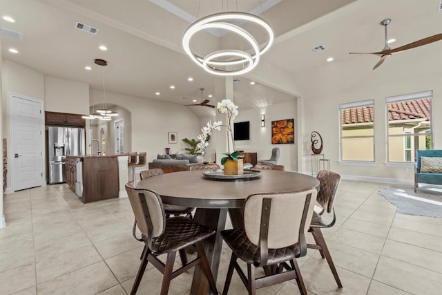 9110 Bayshore Bnd Unit 30, Austin, TX 78726 - dining room featuring recessed lighting, light tile patterned floors, ceiling fan, and a chandelier