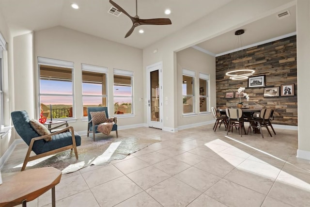 9110 Bayshore Bnd Unit 30, Austin, TX 78726 - living area featuring light tile patterned floors, a ceiling fan, recessed lighting, vaulted ceiling, and a chandelier
