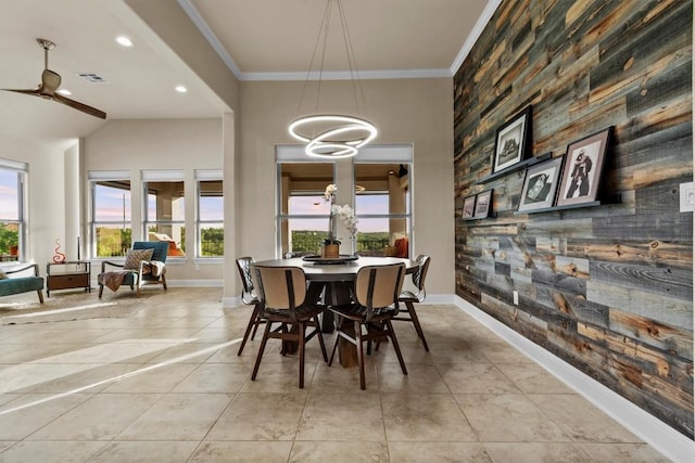 9110 Bayshore Bnd Unit 30, Austin, TX 78726 - dining room with a ceiling fan, a chandelier, light tile patterned floors, an accent wall, and recessed lighting