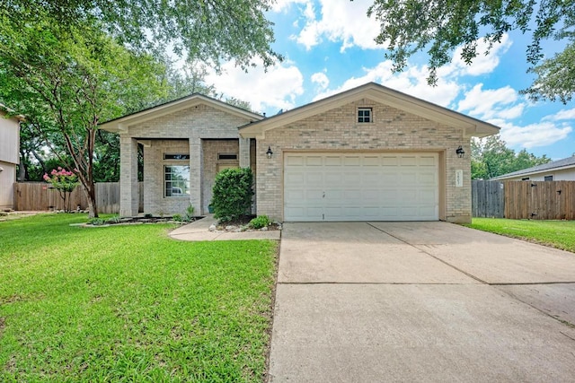 1803 Kwai Cv, Leander, TX 78641 - ranch-style home with brick siding and driveway