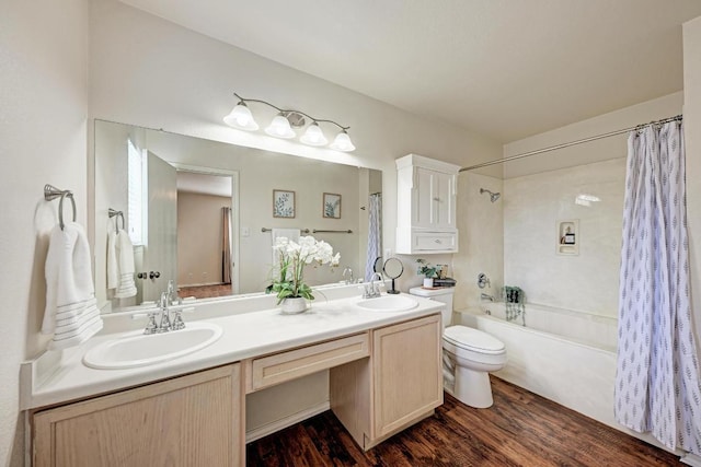 1803 Kwai Cv, Leander, TX 78641 - full bathroom with double vanity, shower / bathtub combination with curtain, and wood finished floors