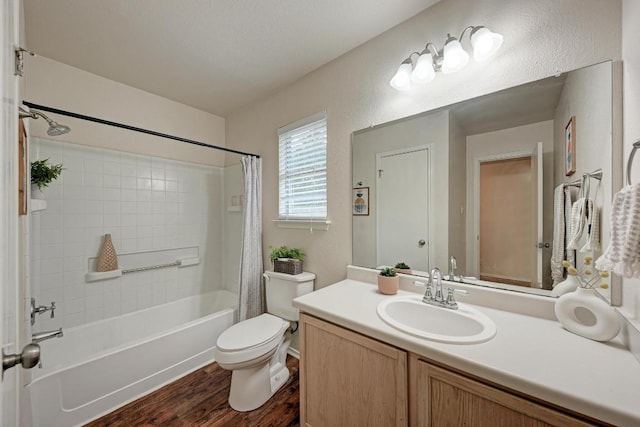 1803 Kwai Cv, Leander, TX 78641 - full bath with wood finished floors, shower / bath combo, vanity, and a textured wall