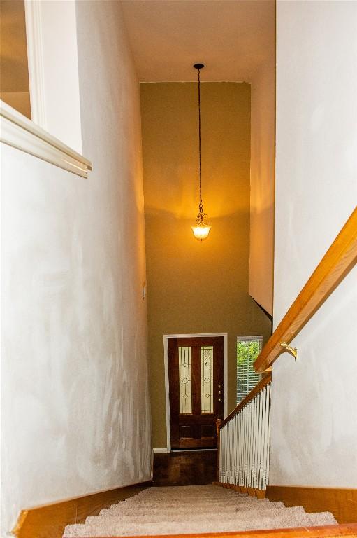 2003 White Dove Pass, Austin, TX 78734 - stairs with a towering ceiling