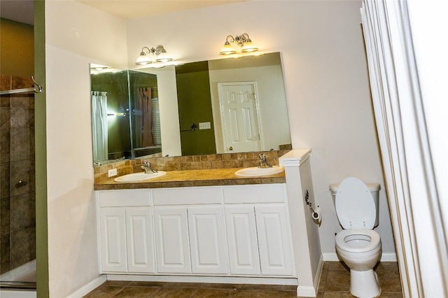 2003 White Dove Pass, Austin, TX 78734 - bathroom featuring double vanity, tiled shower, and tile patterned floors