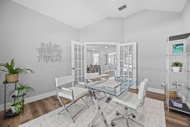 15001 Doria Dr, Austin, TX 78728 - office area featuring french doors, wood finished floors, and vaulted ceiling