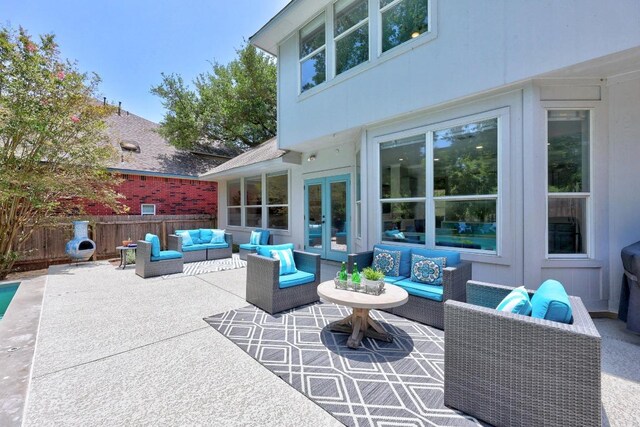 15001 Doria Dr, Austin, TX 78728 - view of patio / terrace with french doors and an outdoor hangout area