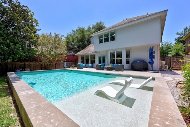 15001 Doria Dr, Austin, TX 78728 - view of swimming pool with outdoor lounge area, a fenced backyard, a patio, and a grill