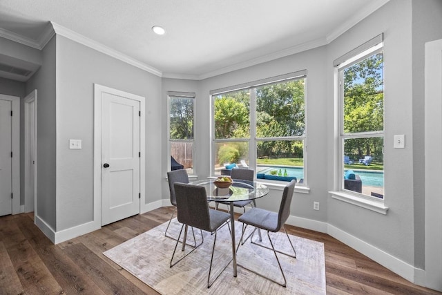 15001 Doria Dr, Austin, TX 78728 - dining space with wood finished floors and ornamental molding