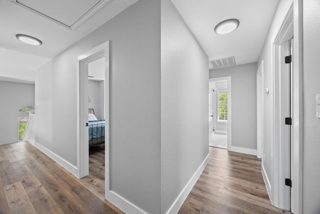 15001 Doria Dr, Austin, TX 78728 - hall with wood finished floors and baseboards