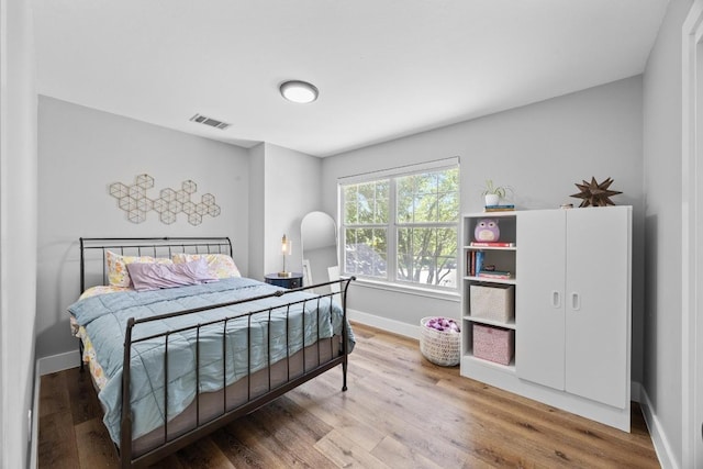 15001 Doria Dr, Austin, TX 78728 - bedroom featuring wood finished floors