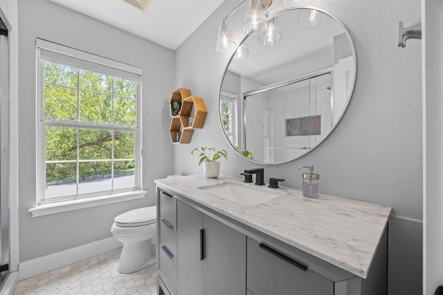 15001 Doria Dr, Austin, TX 78728 - full bath with vanity, plenty of natural light, and a shower stall