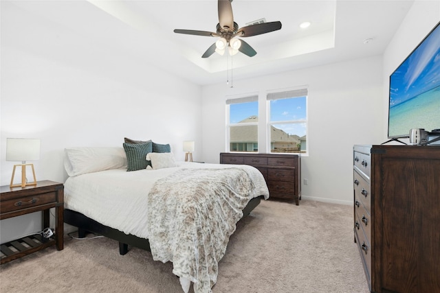2616 Danbury Ln, Leander, TX 78641 - bedroom with a raised ceiling, light carpet, and ceiling fan