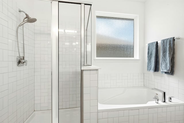 2616 Danbury Ln, Leander, TX 78641 - full bath featuring a shower stall and a garden tub