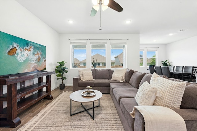 2616 Danbury Ln, Leander, TX 78641 - living room with wood finished floors, ceiling fan, and recessed lighting