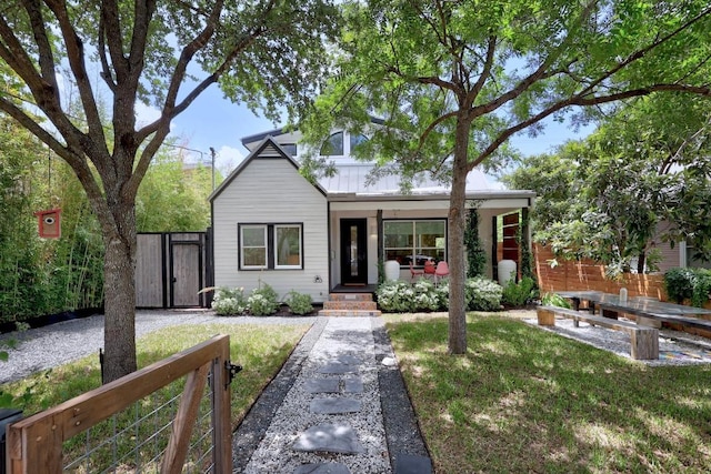 1708 Briar St, Austin, TX 78704 - view of front of property featuring a porch and a gate