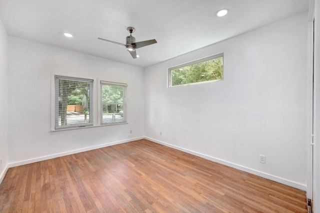1708 Briar St, Austin, TX 78704 - spare room featuring wood finished floors, a ceiling fan, and recessed lighting