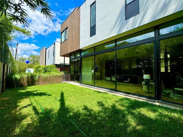1315 W 9th St Unit B, Austin, TX 78703 - rear view of house featuring a yard