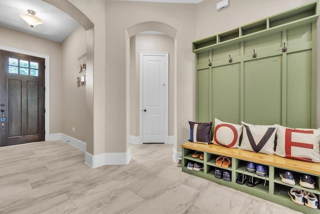101 Dorado St, Georgetown, TX 78628 - mudroom featuring arched walkways and light marble finish flooring