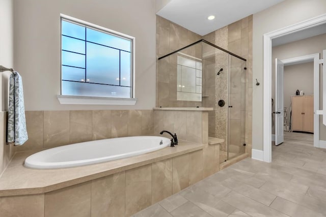 101 Dorado St, Georgetown, TX 78628 - full bathroom with a bath, a stall shower, and tile patterned floors