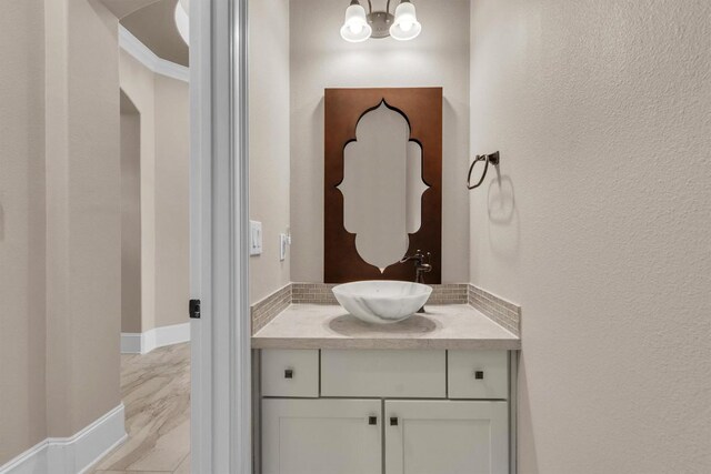 101 Dorado St, Georgetown, TX 78628 - bathroom featuring vanity and a chandelier