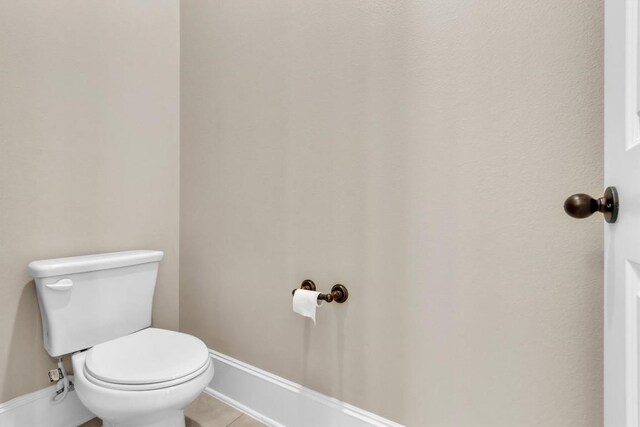 101 Dorado St, Georgetown, TX 78628 - bathroom with toilet and tile patterned floors